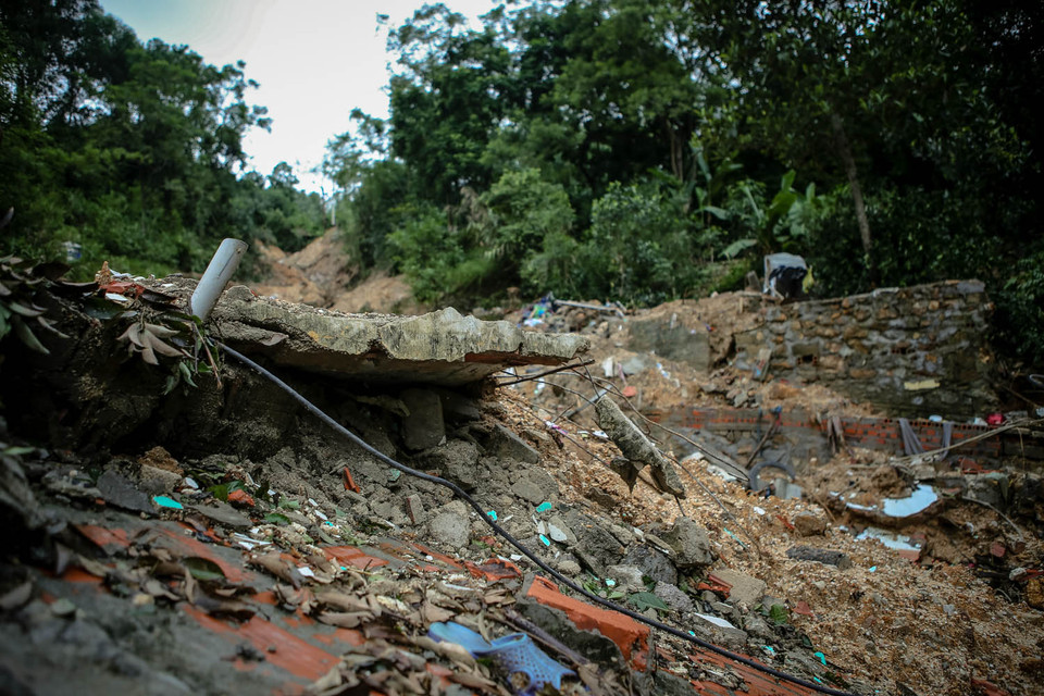 Đây là gia đình bị thiệt hại lớn nhất về người và tài sản do mưa lớn gây ngập lụt, sạt lở đất nghiêm trọng ở Quảng Ninh trong những ngày qua. (Ảnh: Minh Sơn/Vietnam+)