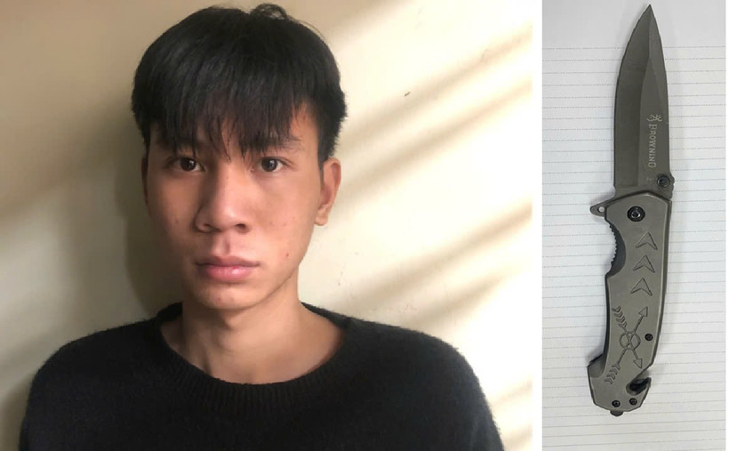 Đối tượng Trần Đình Minh sử dụng hung khí để thực hiện hành vi cướp tài sản. (Ảnh: PV/Vietnam+)