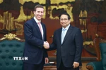Thủ tướng Phạm Minh Chính tiếp ông Jeffrey David Perlman, Tổng giám đốc điều hành Quỹ đầu tư Warburg Pincus (Hoa Kỳ). (Ảnh: Dương Giang/TTXVN)