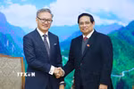 Thủ tướng Phạm Minh Chính tiếp Bộ trưởng Ngoại giao Lào Thongsavanh Phomvihane. (Ảnh: Dương Giang/TTXVN)