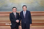 Thường trực Ban Bí thư Trần Cẩm Tú và Chủ tịch CPP, Chủ tịch Thượng viện Campuchia Hun Sen. (Ảnh: Phương Hoa/TTXVN)