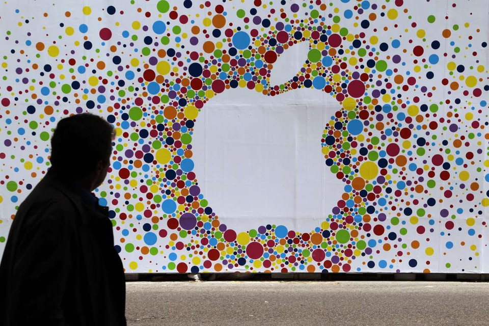 Ngày 10/2/2015, cổ phiếu của Apple đã chạm mốc 122,02 USD. Với mức giá này, vốn hóa trên thị trường của Apple là khoảng 705 tỷ USD, khiến cho Apple trở thành công ty đầu tiên trên thế giới đóng cửa phiên giao dịch với giá trị lên tới hơn 700 tỷ USD. (Nguồn: Corbis)