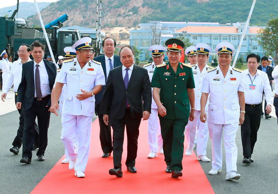 Thủ tướng Nguyễn Xuân Phúc tới tham dự lễ thượng cờ. (Ảnh: Thống Nhất/TTXVN)