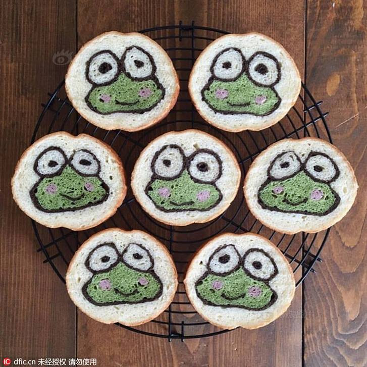 Mỗi lát cắt bánh đều ẩn chứa khuôn mặt của những nhân vật hoạt hình ngộ nghĩnh. (Nguồn: CCTVNews)