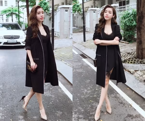 Kết hợp đầm ren đen và áo khoác dáng dài tiệp màu, Elly Trần không chỉ khoe được vẻ gợi cảm một cách chừng mực mà còn thể hiện gu thời trang tuyệt mỹ, bắt nhịp xu hướng.