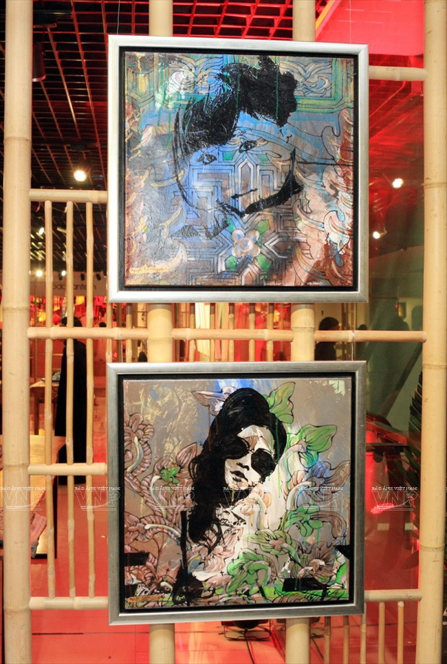  Những bức tranh chân dung pha trộn với những đường nét mảng miếng của nghệ thuật đồ họa hiện đại. (Ảnh: Trần Thanh Giang/Báo ảnh Việt Nam)
