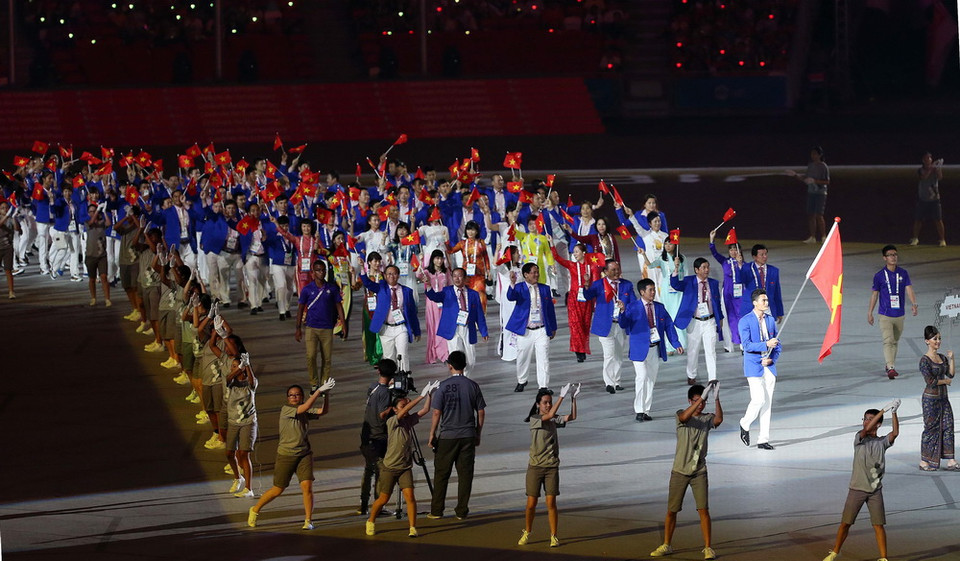 Đoàn Việt Nam trong lễ khai mạc. (Ảnh: Quốc Khánh/TTXVN)