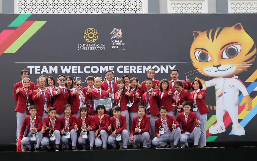 Đoàn Thể thao Việt Nam tại buổi lễ thượng cờ. (Ảnh: Quốc Khánh/TTXVN)