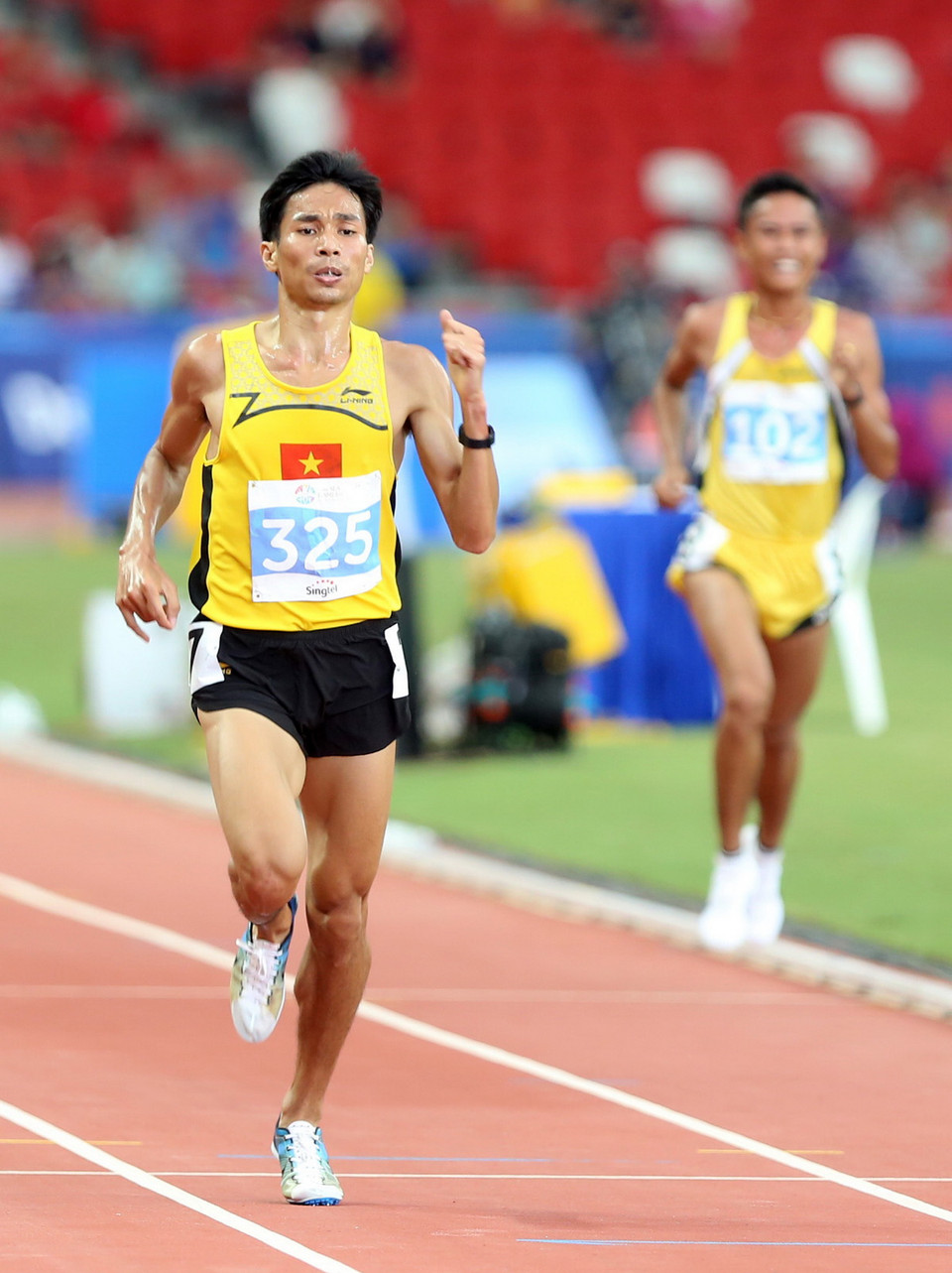 Vận động viên Nguyễn Văn Lai (số 325-Việt Nam) bứt phá về đích. (Ảnh: Quốc Khánh/TTXVN)