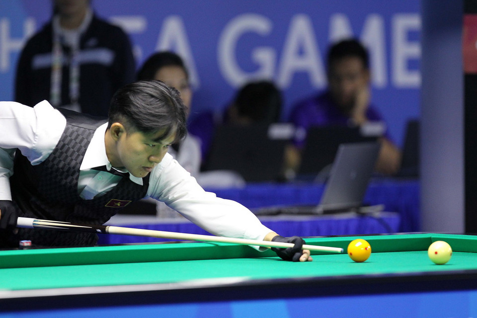 Vận động viên Trần Phi Hùng thi đấu trong trận chung kết. (Ảnh: Quốc Khánh/TTXVN)