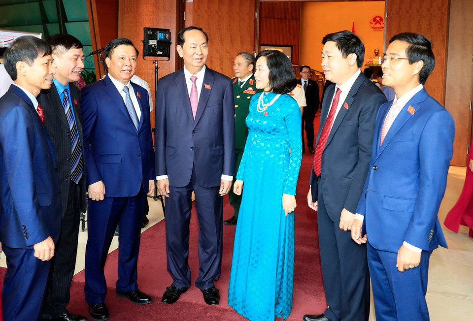 Chủ tịch nước Trần Đại Quang gặp gỡ các đại biểu Quốc hội. (Ảnh: Nhan Sáng/TTXVN)