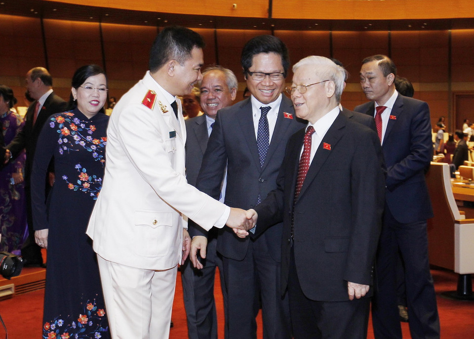  Tổng Bí thư Nguyễn Phú Trọng và các đại biểu dự phiên khai mạc. (Ảnh: Lâm Khánh/TTXVN)