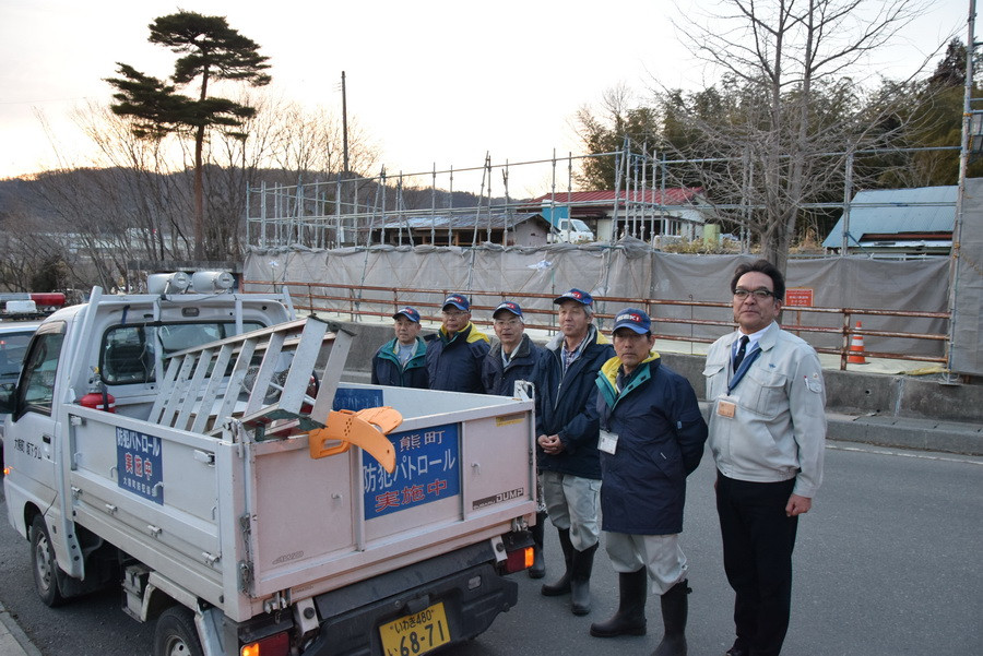 Đội dân phòng tình nguyện tại Okuma thực hiện nhiệm vụ đảm bảo an ninh cho thị trấn. (Ảnh: Nguyễn Tuyến/Vietnam+)