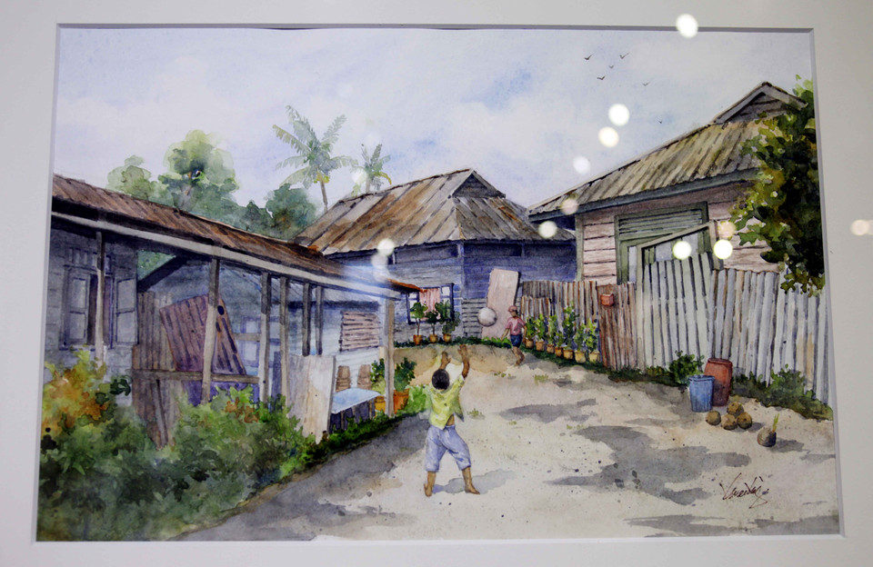 Tác phẩm: ‘Làng cuối cùng, Lorong Buangkok’ của nghệ sĩ Ng Kwee King. (Ảnh: Doãn Đức/Vietnam+)