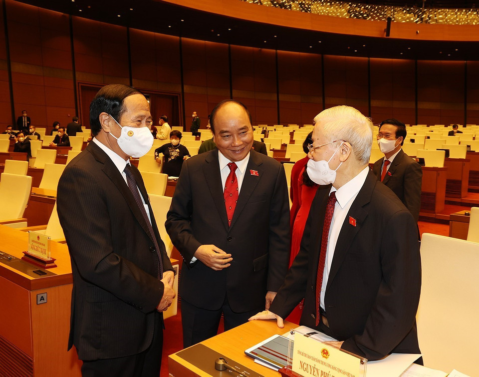 Tổng Bí thư Nguyễn Phú Trọng, Chủ tịch nước Nguyễn Xuân Phúc và Phó Thủ tướng Lê Văn Thành dự Lễ khai mạc Kỳ họp thứ 2, Quốc hội khóa XV. (Ảnh: Trí Dũng/TTXVN)