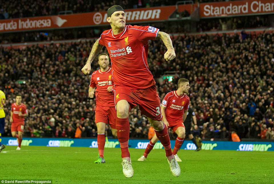 Các cầu thủ Liverpool ăn mừng khi bàn thắng muộn của Martin Skrtel giúp họ giữ lại 1 điểm tại sân Anfield. (Nguồn: David Rawcliffe/Propaganda) 