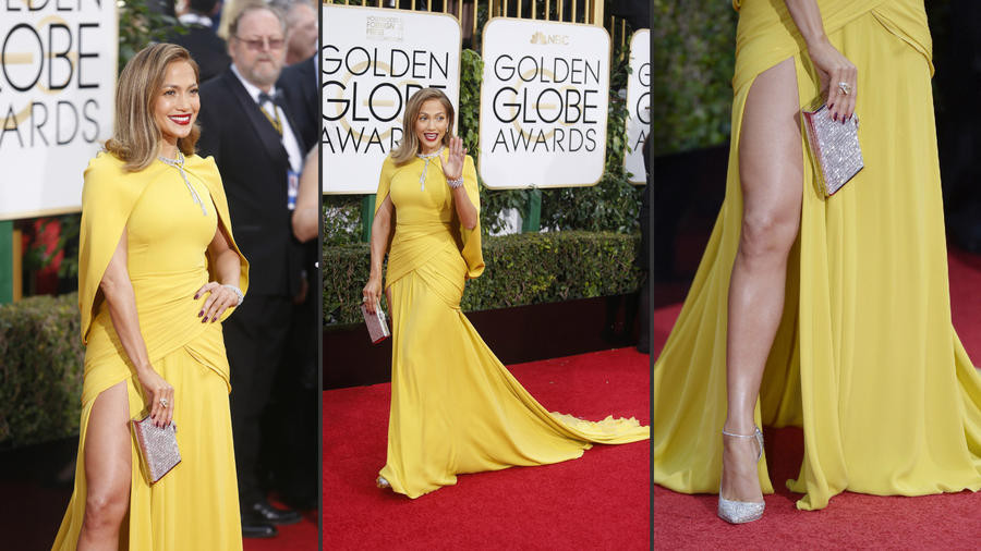 Jennifer Lopez diện chiếc váy màu vàng nhạt xẻ tà. (Nguồn: latimes.com)