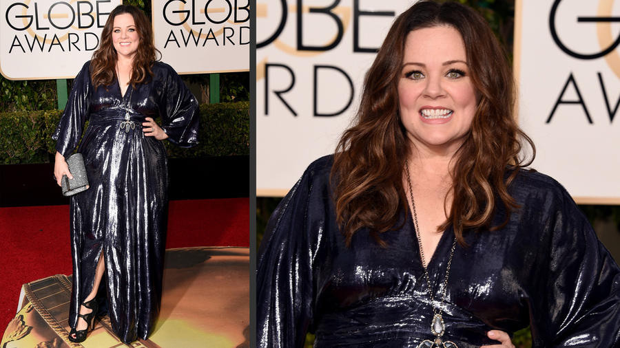 Chiếc váy màu xanh Melissa McCarthy không thực sự giúp cô khắc phục những khuyết điểm bản thân, khiến cô phần nào bị lu mờ bên cạnh nhiều ngôi sao khác. (Nguồn: latimes)