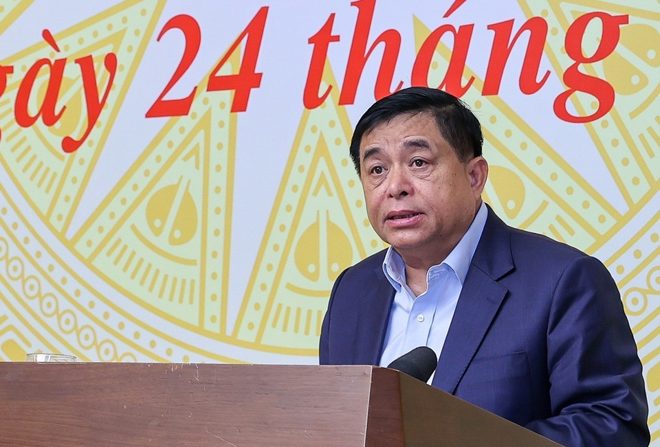 Bộ trưởng Bộ Kế hoạch và Đầu tư Nguyễn Chí Dũng báo cáo tại hội nghị. (Ảnh: Dương Giang/TTXVN)