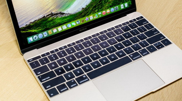 Làm cho máy tính xách tay mỏng hơn, Apple đã thiết kế hoàn toàn lại bàn phím, trackpad và pin.