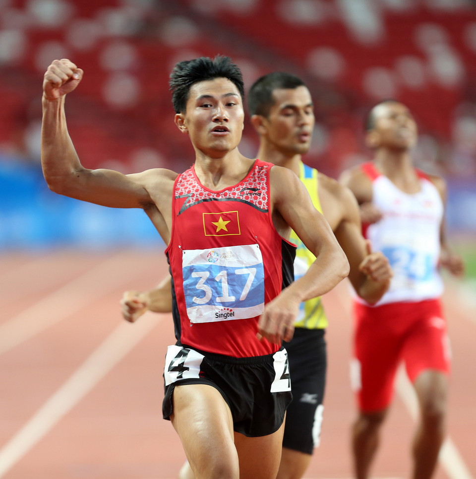 Niềm vui của vận động viên Lê Trọng Hinh (số 317-Việt Nam) sau khi về đích. (Ảnh: Quốc Khánh/TTXVN) 