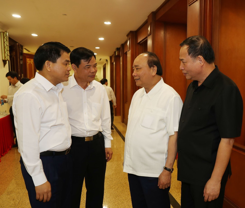 Thủ tướng Nguyễn Xuân Phúc với các đại biểu. (Ảnh: Trí Dũng/TTXVN)