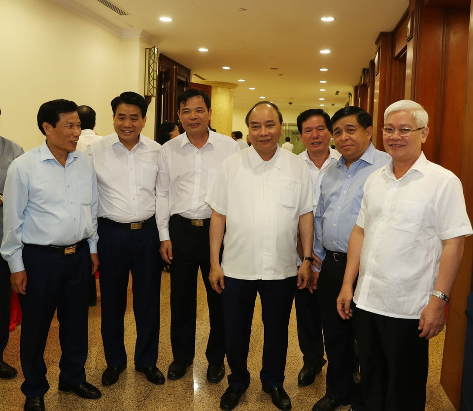 Thủ tướng Nguyễn Xuân Phúc với các đại biểu. (Ảnh: Trí Dũng/TTXVN)