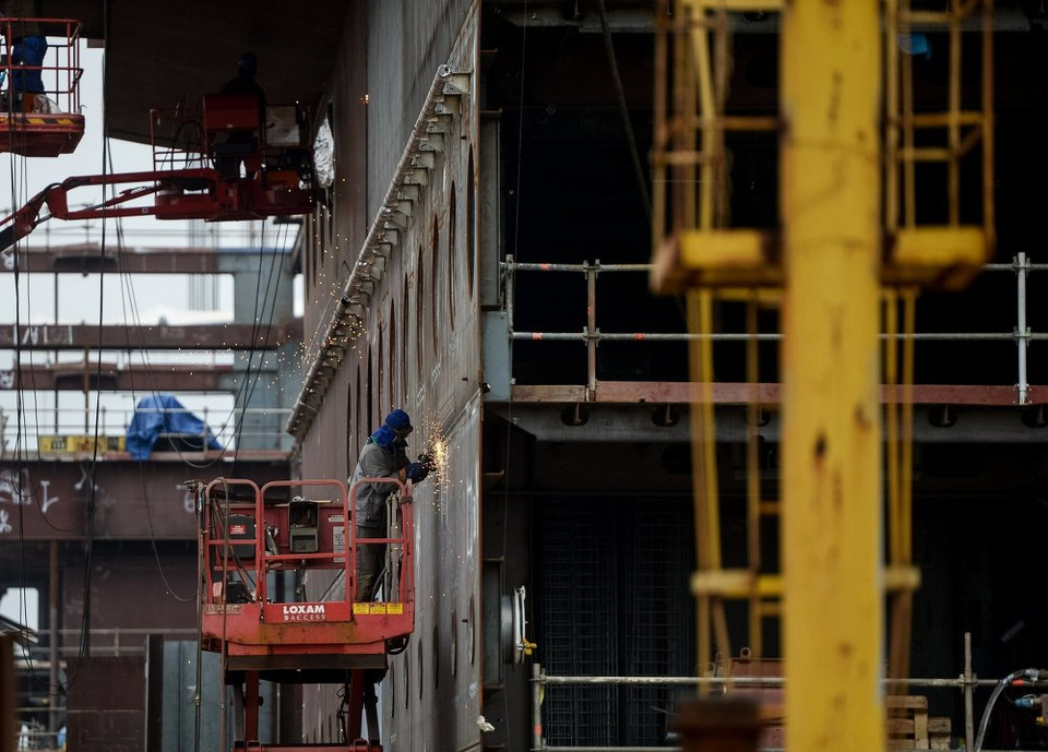 Công nhân đang làm việc. (Nguồn: sputniknews)