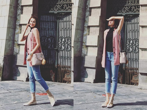 Tuần qua, Trúc Diễm cũng trở thành 'tín đồ' của pastel khi diện áo gilê hồng phấn cùng áo sát nách cổ lọ và quần jeans. Người đẹp hoàn thiện phong cách dạo phố bằng đôi giày bệt màu nude và túi đeo xinh xắn tiệp màu.