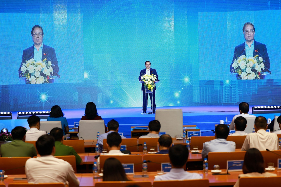 Thủ tướng Phạm Minh Chính phát biểu tại Hội nghị sơ kết sáu tháng thực hiện Đề án 06 của thành phố Hà Nội. (Ảnh: Dương Giang/TTXVN)