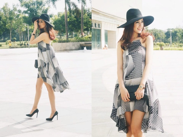Mai Phương Thúy ngày càng ghi điểm nhờ phong cách nữ tính nhẹ nhàng. Diện một thiết kế đầm bất đối xứng (high-low dress) của nhà thiết kế Linh Đoàn, người đẹp kết hợp đơn giản với giày cao gót, mũ rộng vành và túi cầm tay đơn sắc cũng đủ nổi bật trên phố