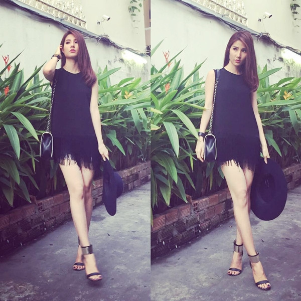Diễm My 9X diện cả 'cây' đồ đen mà vẫn cuốn hút. Điểm nhấn chính là đôi sandals có chi tiết quai ôm cổ chân màu ánh kim thu hút ánh nhìn.