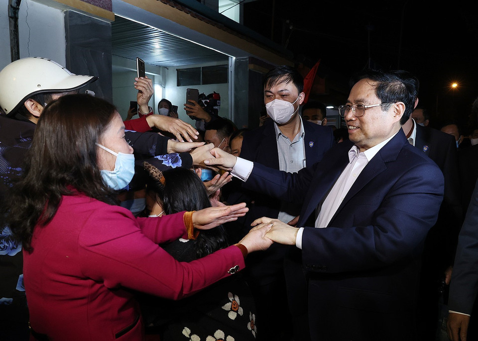 Thủ tướng Phạm Minh Chính với nhân dân thành phố Thanh Hóa, ngày 24/1/2022. (Ảnh: Dương Giang/TTXVN)