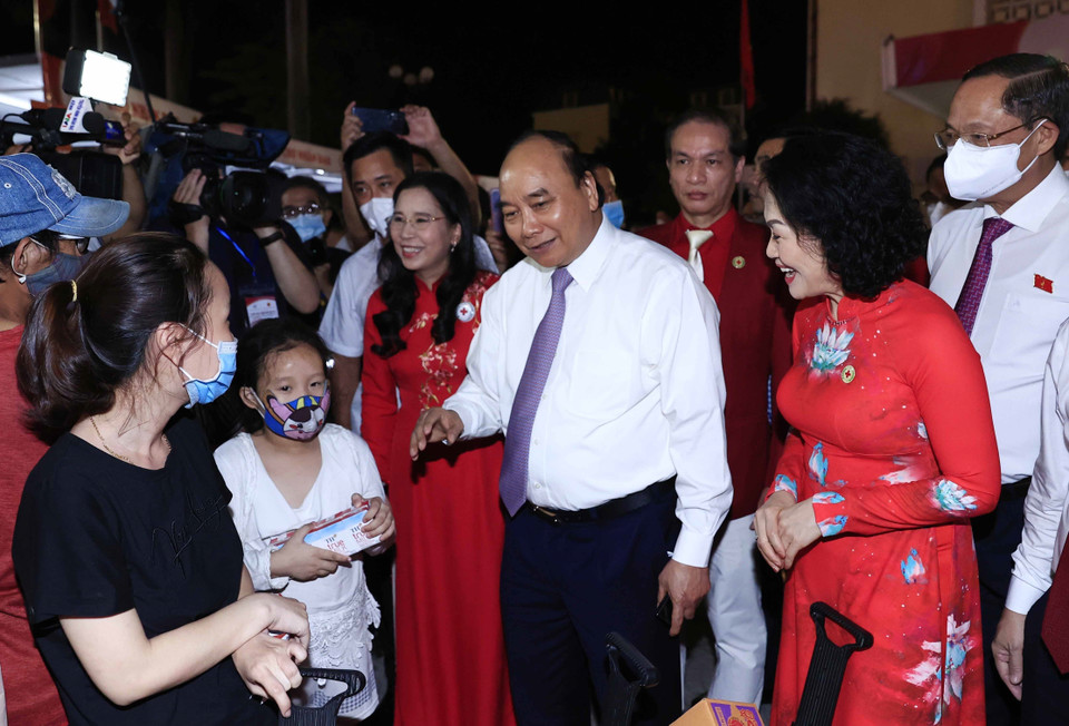 Chủ tịch nước Nguyễn Xuân Phúc và các đại biểu tại Lễ phát động Tháng Nhân đạo năm 2022. (Ảnh: Thống Nhất/TTXVN)