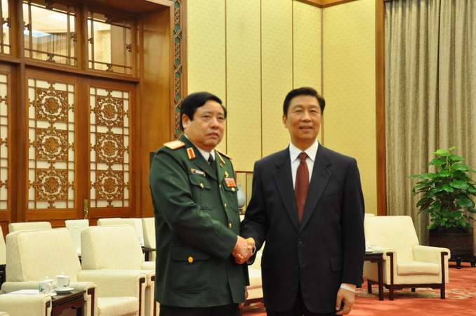 Phó Chủ tịch Trung Quốc Lý Nguyên Triều tiếp Bộ trưởng Quốc phòng Phùng Quang Thanh. (Ảnh: Yến Đức/TTXVN)