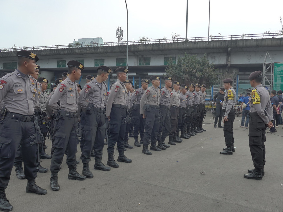 Lực lượng cảnh sát tăng cường đến hiện trường. (Ảnh: Đỗ Quyên/Vietnam+)