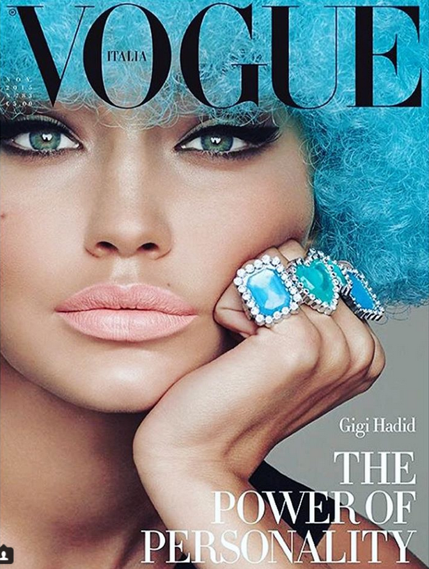 Hình ảnh này được sử dụng cho tạp chí Vogue Italia và cũng là một trong những shoot hình đáng nhớ của Gigi khi cô nàng được biến đổi thành một cô gái da màu rám nắng, cặp môi pastel tương phản mạnh mẽ với màu mắt và tóc.