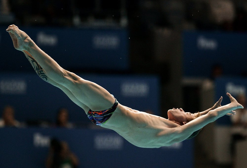 Vận động viên Nikita Shleikher (Nga) trình diễn bài nhảy cầu 10m ở bán kết FINA 16. (Nguồn: Sputniknews)