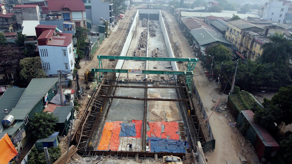 Hầm chui Kim Đồng-Giải Phóng sẽ có quy mô bốn làn xe, trong đó hầm kín dài 140m, hầm hở dài 320m. Đoạn qua hầm mỗi chiều hai làn xe rộng 3,5m/làn, đoạn ngoài hầm mỗi chiều ba làn xe rộng 3,5m/làn. (Ảnh: Huy Hùng/TTXVN)