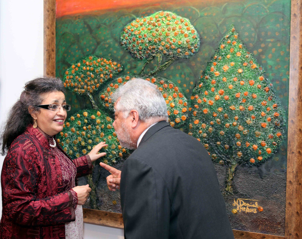 Các tác phẩm cũng thể hiện những suy nghĩ và cả niềm ngưỡng mộ của một nghệ sĩ Maroc đối với nền văn hóa Việt Nam phong phú, đa dạng, với phong cảnh hữu tình và con người nhân ái. (Ảnh: Doãn Đức/Vietnam+)