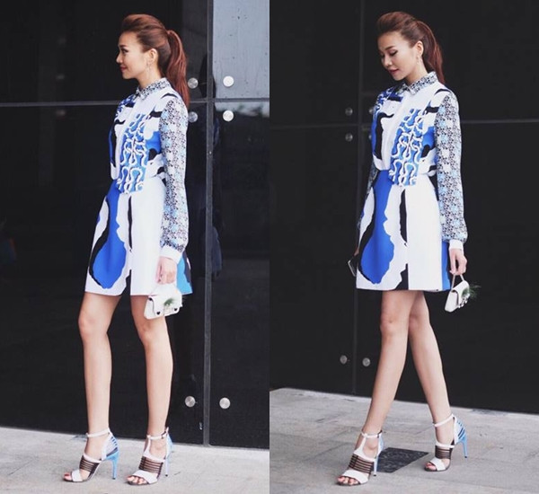 Buổi ghi hình tiếp theo của vòng sơ khảo, Thanh Hằng kết hợp sơmi phối màu độc đáo cùng chân váy ngắn ton-sur-ton. Người đẹp điểm trang bộ cánh bằng xắc cầm tay nhỏ xinh và giày cao gót dáng lồng (caged heels) thời thượng.