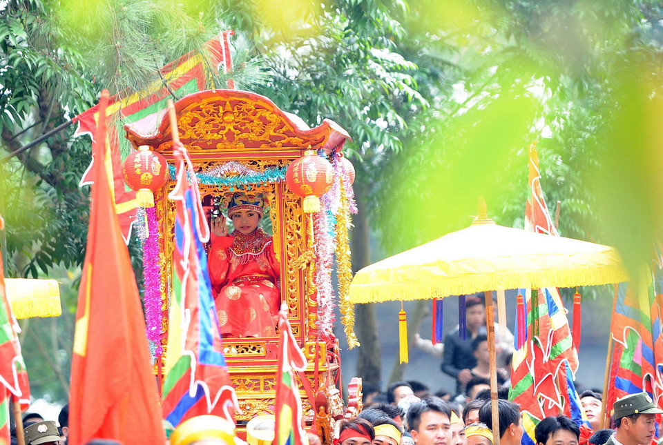 Lễ rước kiệu Tướng trẻ trong ngày hội. (Ảnh: Quang Quyết/TTXVN) 