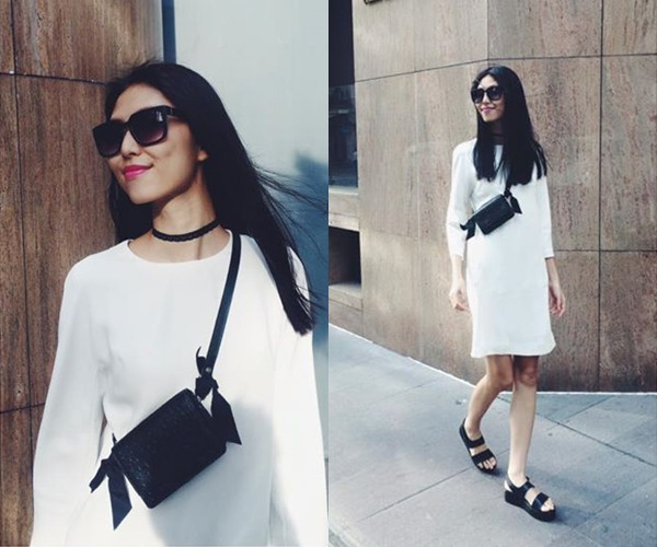 Bộ đầm trắng nhã nhặn của Thùy Dương Tyhd thêm nét phóng khoáng với túi cỡ nhỏ đeo chéo rất độc đáo.