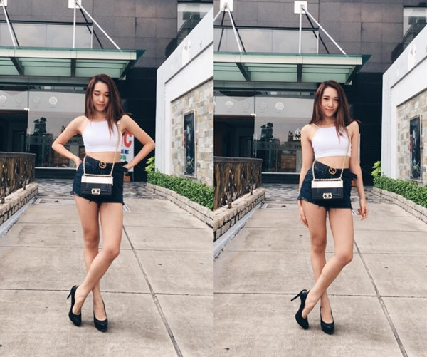 Cô ca sỹ Emily khoe dáng gợi cảm với áo lửng và quần shorts jeans cạp cao, lôi cuốn mọi ánh nhìn.