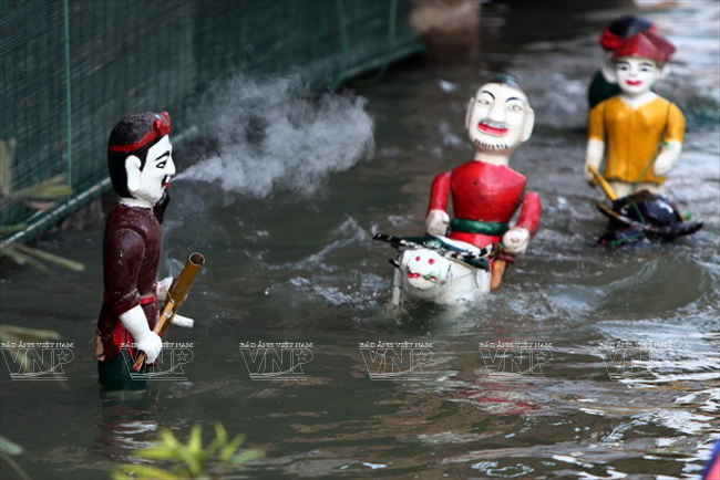  Hình ảnh người nông dân trên ruộng đồng được tái hiện tại phường rối. (Ảnh: Trần Thanh Giang/Báo ảnh Việt Nam)