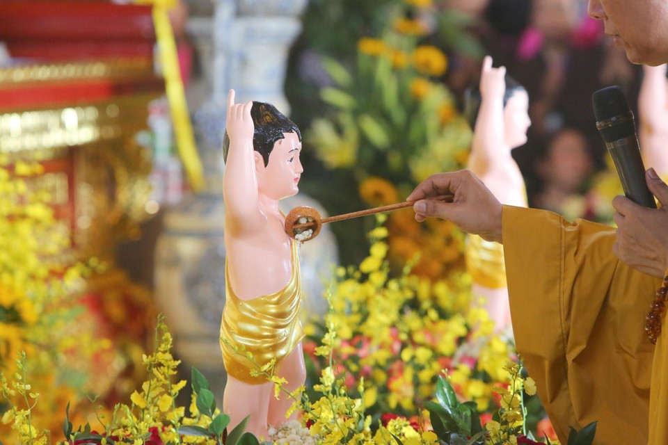 One common tradition is the Bathing the Buddha ceremony, where devotees pour fragrant water over Buddha statues as a symbol of purification