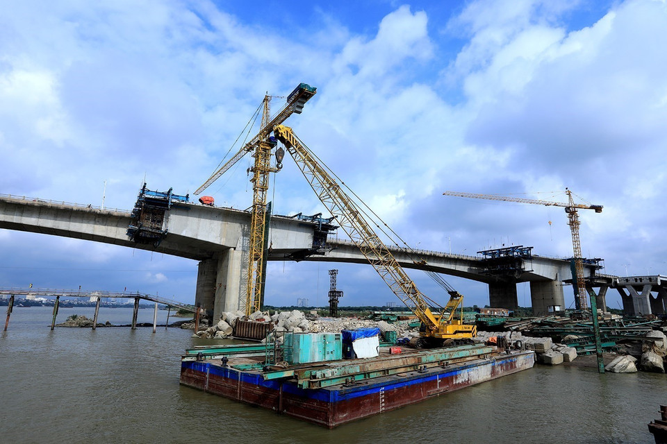 Cầu được thiết kế vĩnh cửu bằng bêtông cốt thép và bêtông cốt thép dự ứng lực với tải trọng thiết kế chịu được động đất cấp 8. (Ảnh: Tuấn Anh/TTXVN)