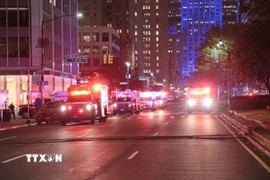 Cảnh sát phong tỏa hiện trường vụ xả súng. (Ảnh: Thanh Tuấn/TTXVN)