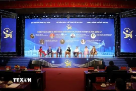 Các đại biểu thảo luận tại hội nghị. (Ảnh: Hoàng Ngọc/TTXVN)