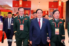 Thủ tướng Phạm Minh Chính đến dự ngày làm việc thứ tư Đại hội XIV của Đảng, sáng 22/1. (Ảnh: TTXVN)